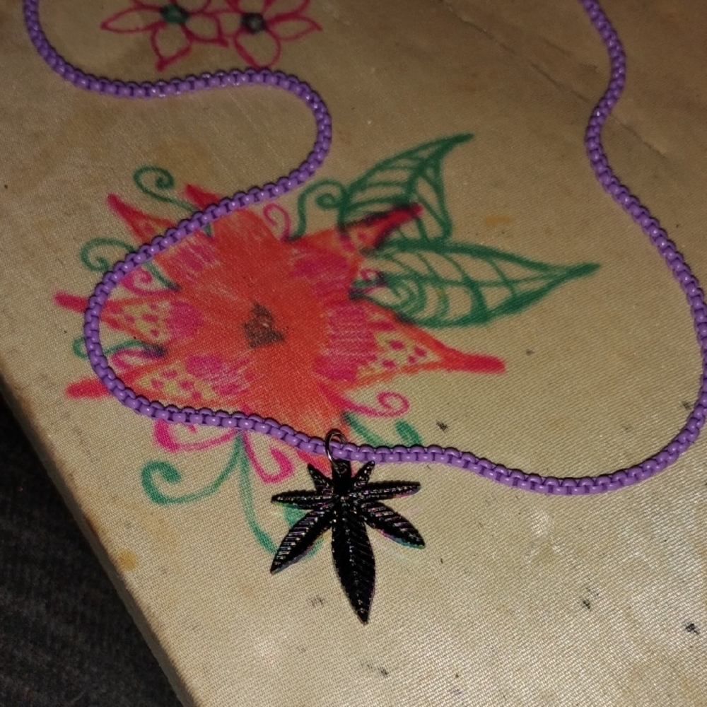 Elegant Iridescent Cannibis Leaf Pendant on Purple Chain Necklace